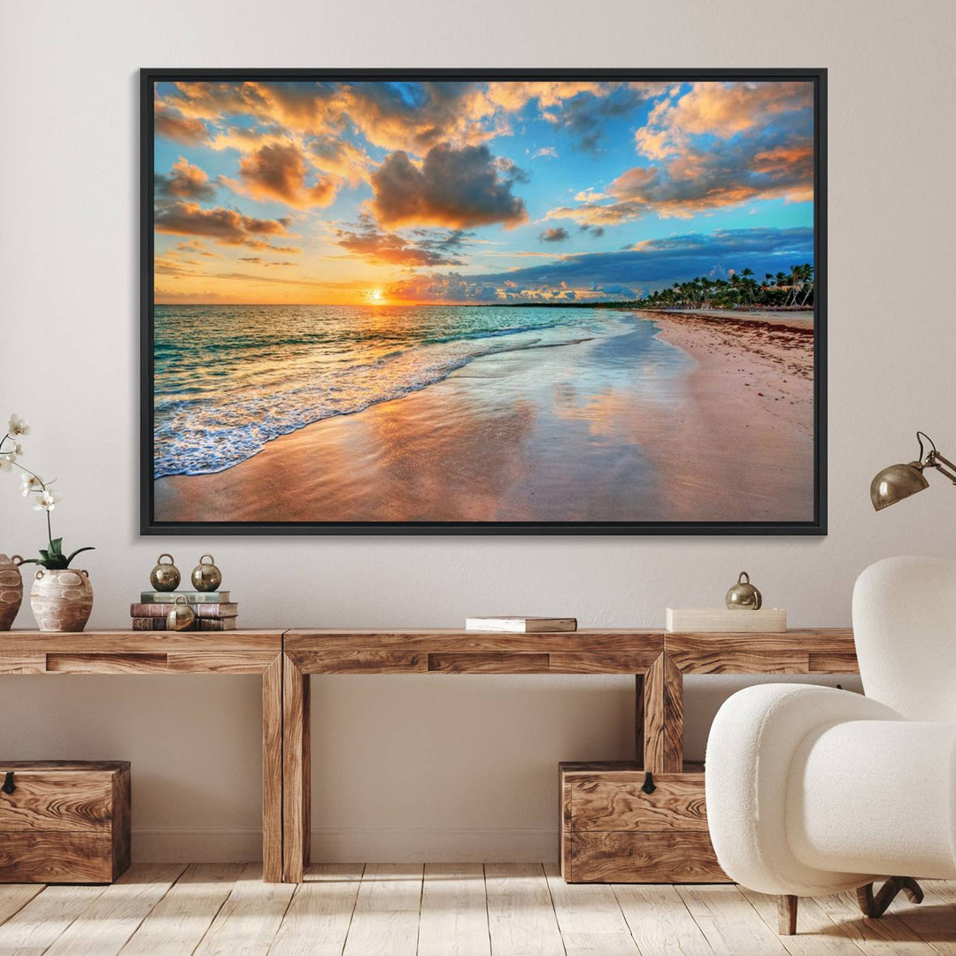 A wall displays Sunset Ocean Waves on Tropical Beach 3-panel canvas art.