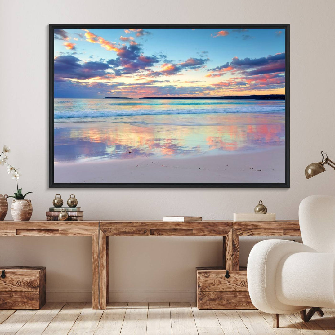 The Tranquil Pastel Sunset Beach Triptych Canvas Art hangs, showcasing its serene beauty.