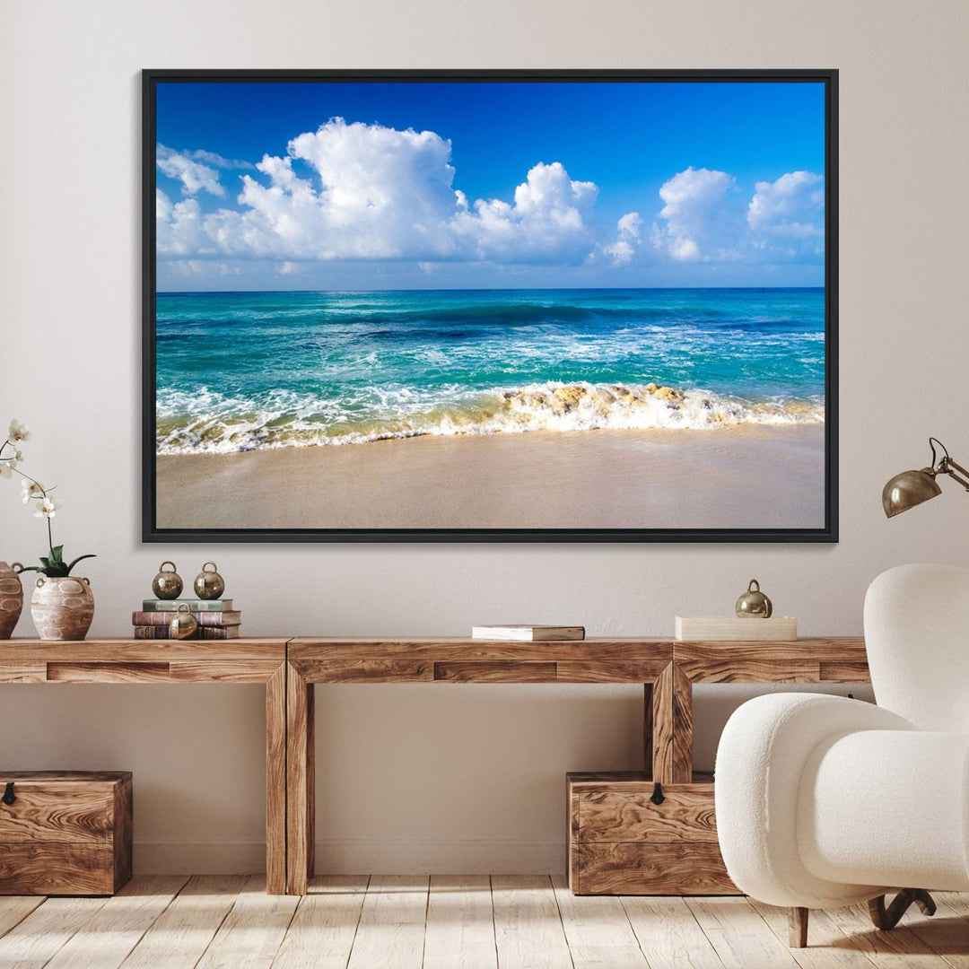 The Tropical Beach 3-Panel Canvas Wall Art features ocean waves gently lapping on a beach under blue skies, making it an ideal choice for coastal decor.