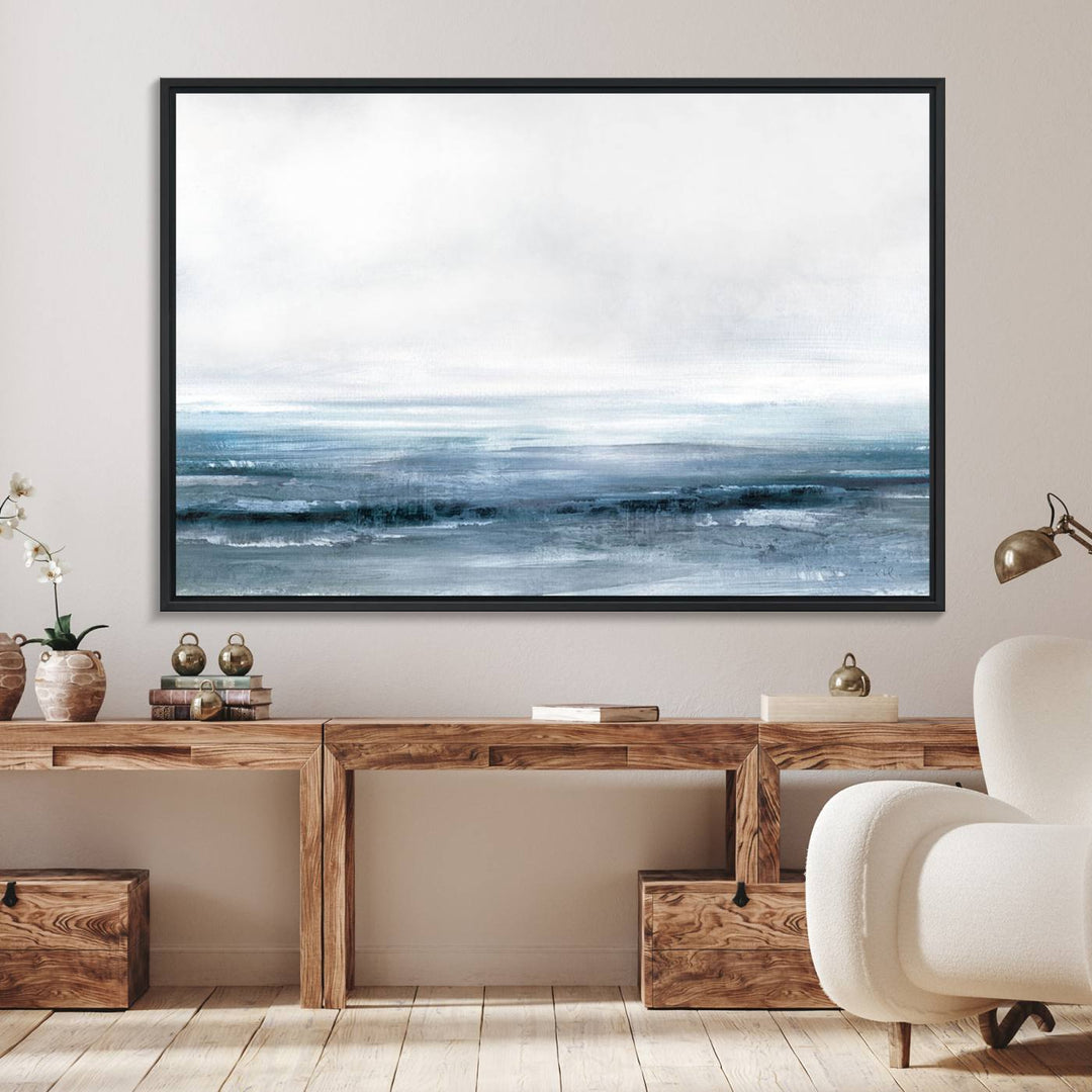 The dining area features Blue Ocean Abstract Artwork on canvas.