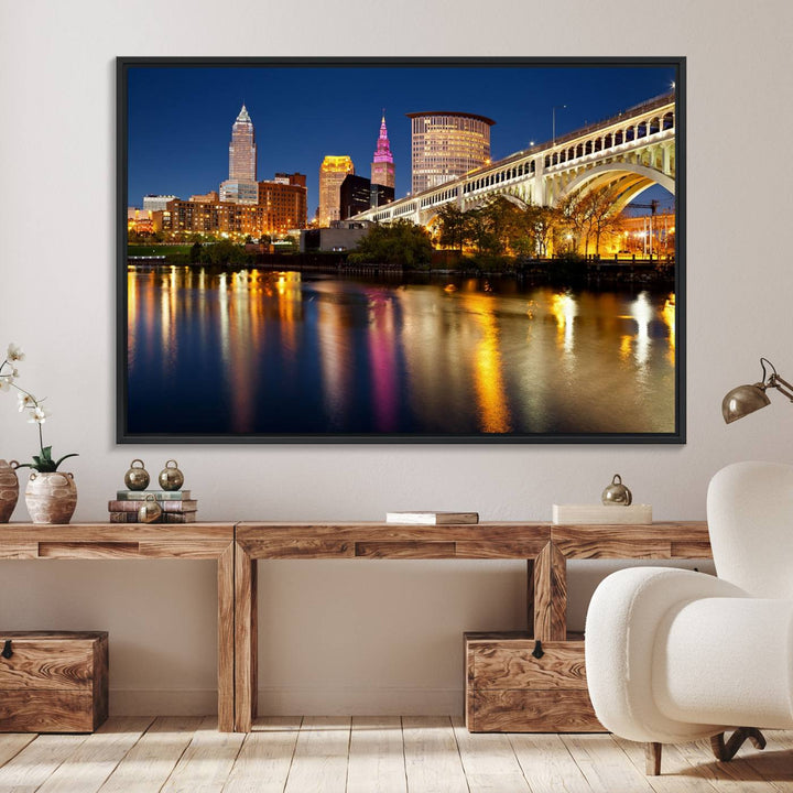 Cleveland Night Skyline Canvas: Cityscape with an illuminated bridge reflecting on calm water.