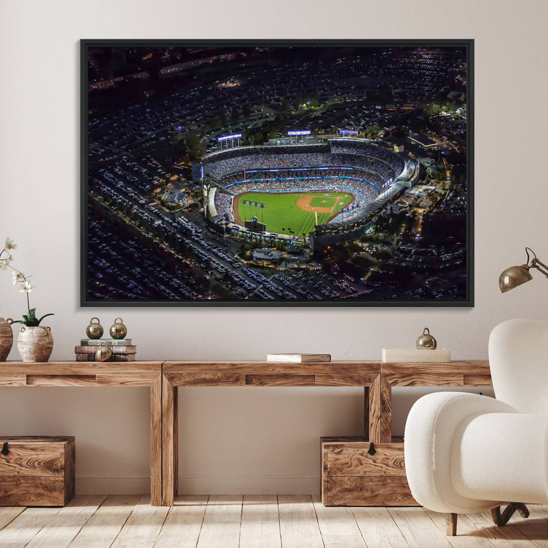 A large Los Angeles Dodgers print of Dodger Stadium at night is displayed near a window.