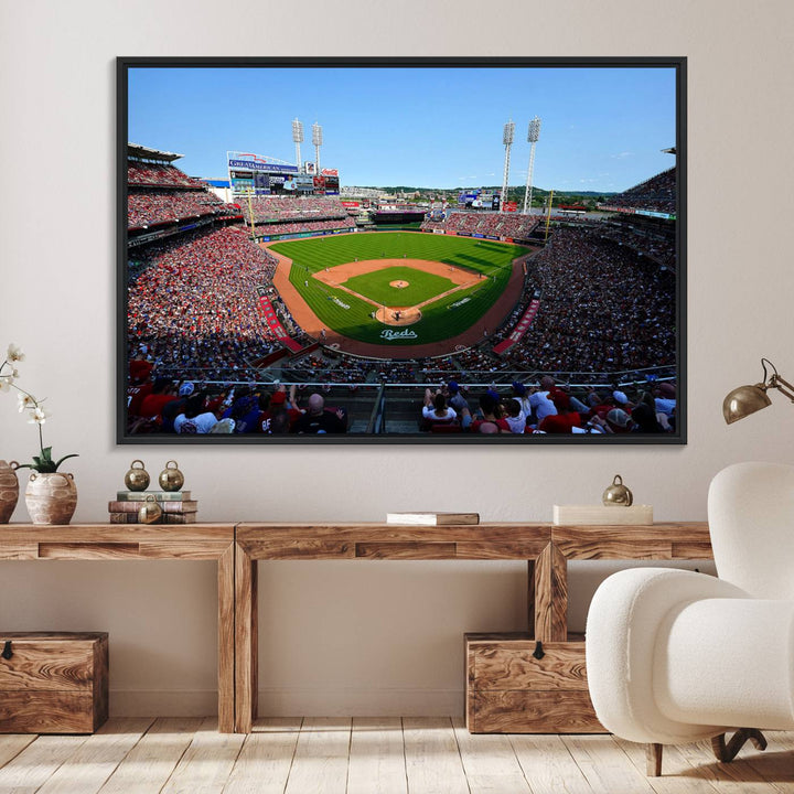 The Cincinnati Reds Baseball Team print of Great American Ball Park Stadium adorns the wall.