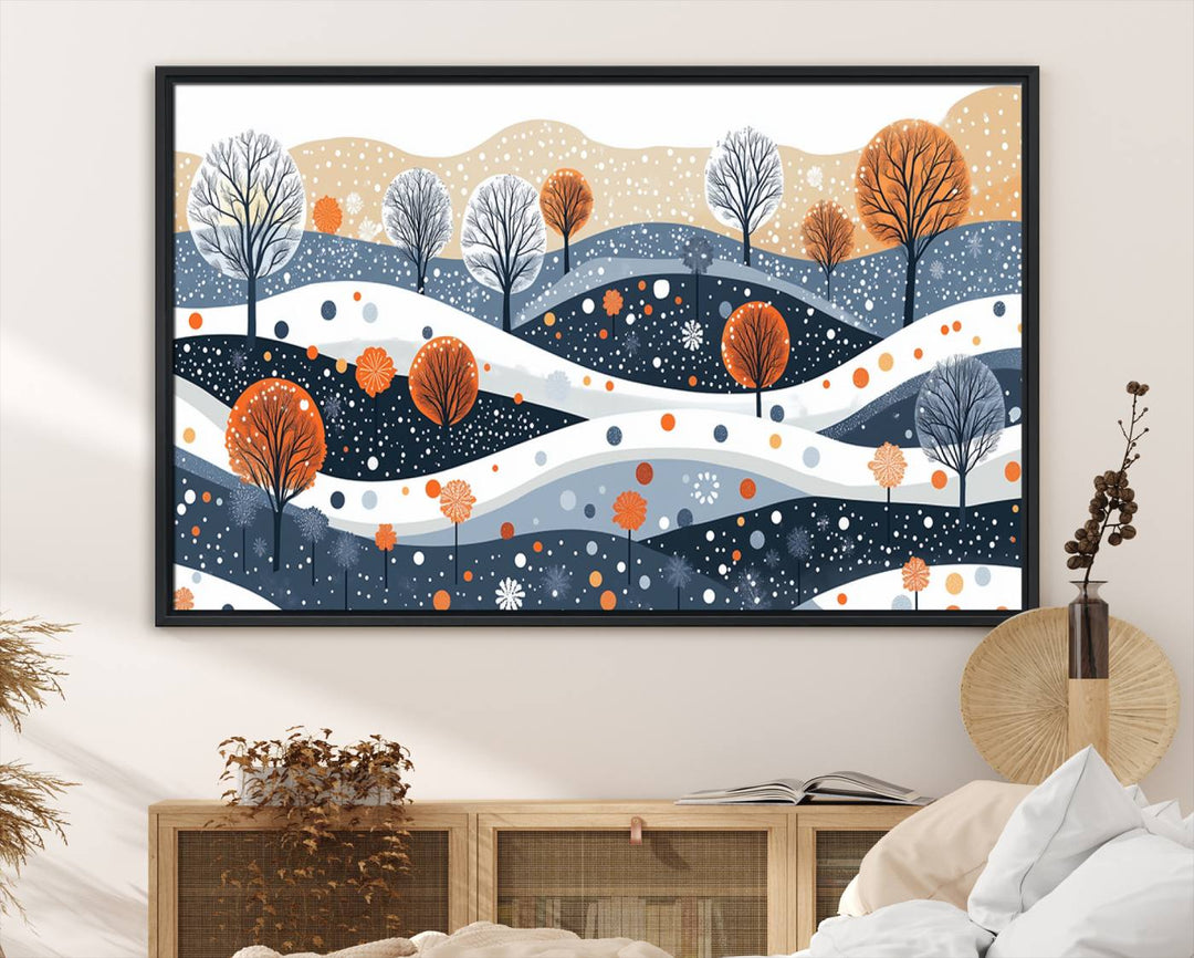 The "Abstract Winter Landscape Canvas Wall Art Print," featuring a triptych of landscapes with trees and hills in vibrant orange, white, and blue hues, adds a gallery-quality finish that transforms the space into an art lover's dream.