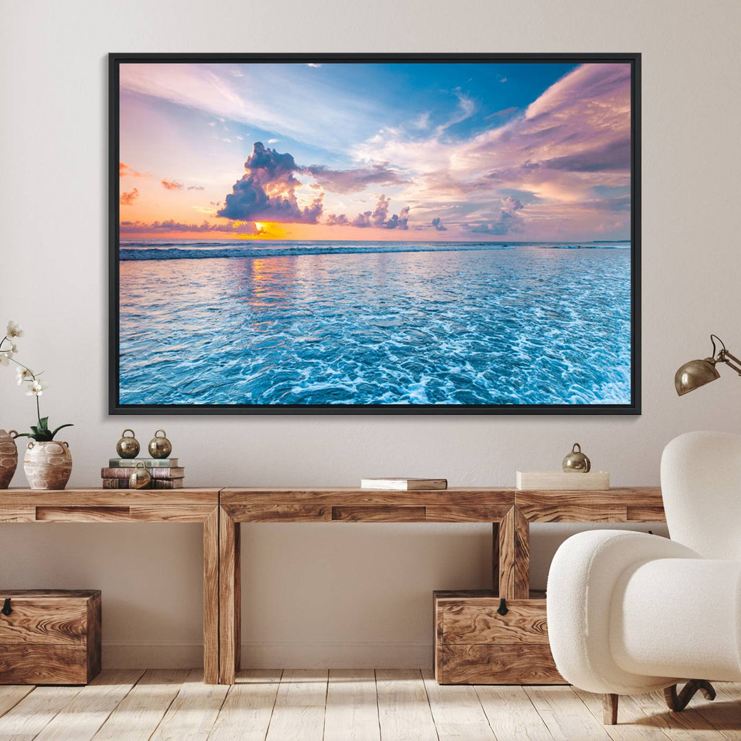 An Ocean Sunset Canvas Wall Art depicting a vibrant sky and rolling waves.