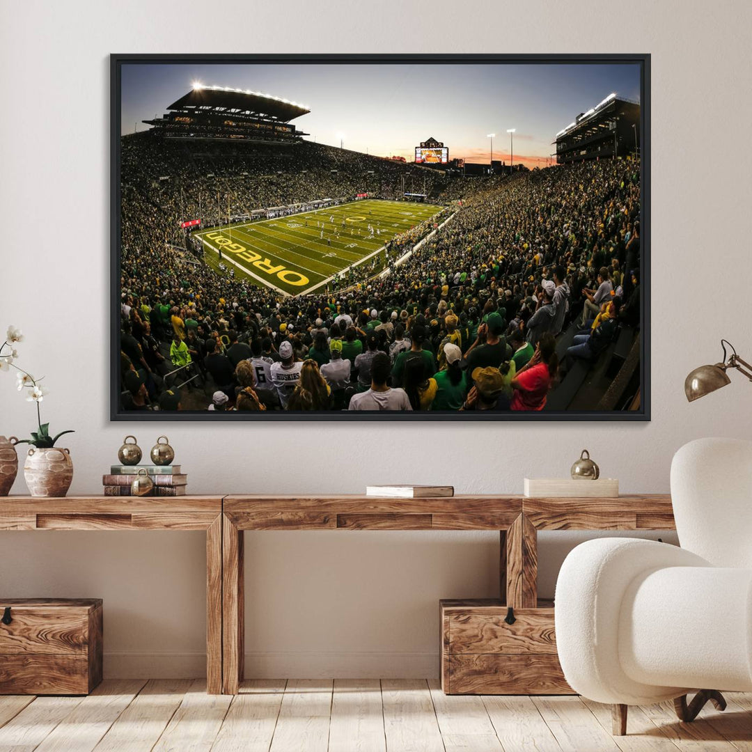 The Oregon Stadium Canvas Wall Art features a depiction of a packed Autzen Stadium with OREGON prominently displayed on the field.