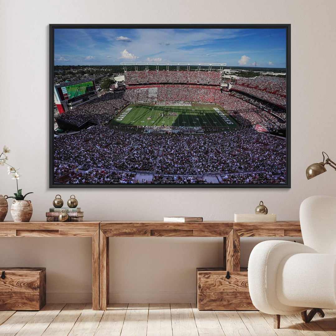 The wall art is a South Carolina Gamecocks print, showcasing Williams-Brice Stadium from a distance under clear skies.