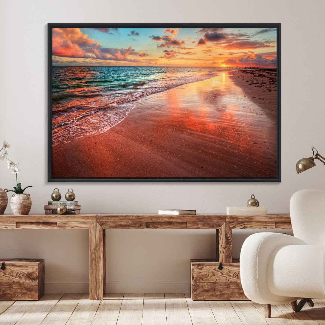 An Ocean Canvas Print depicts a sunset over a beach with reflections.