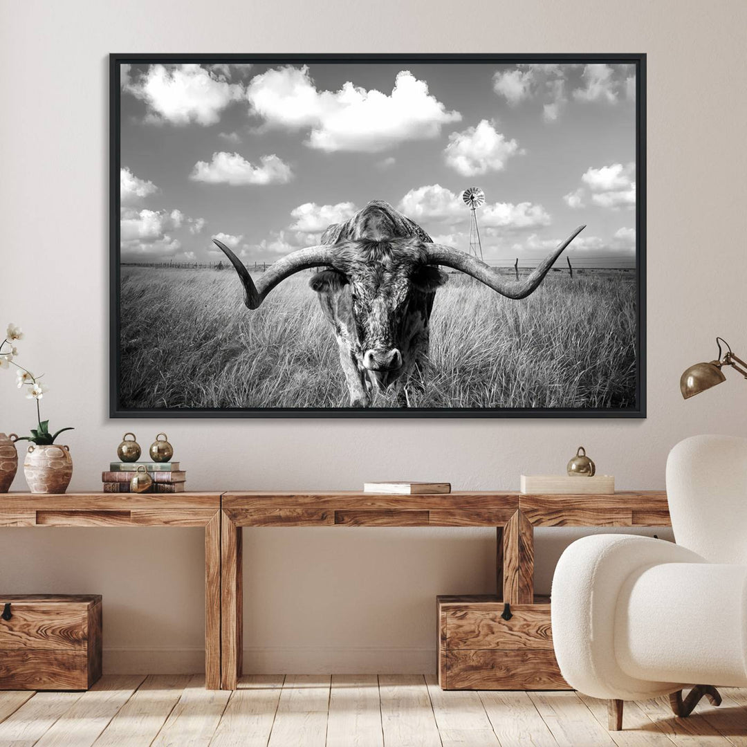 Longhorn Cow Field Canvas Print featuring rustic charm with a windmill backdrop.