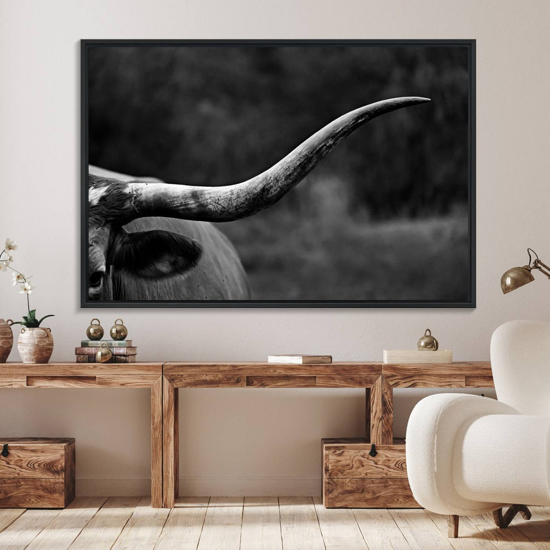 Cow Longhorn Wall Art: This black and white print adds rustic charm.