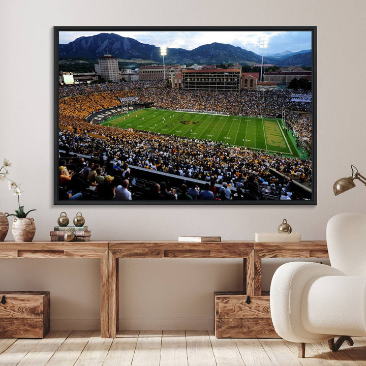 A canvas print captures the Colorado Buffaloes at Folsom Field, framed by mountains in the background.