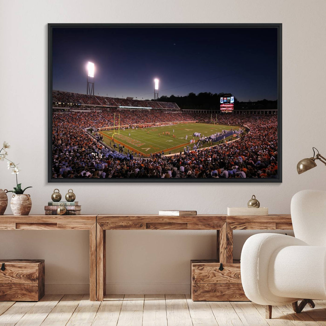 A nighttime game at Scott Stadium, floodlit—a scene from the Virginia Cavaliers Football art print.