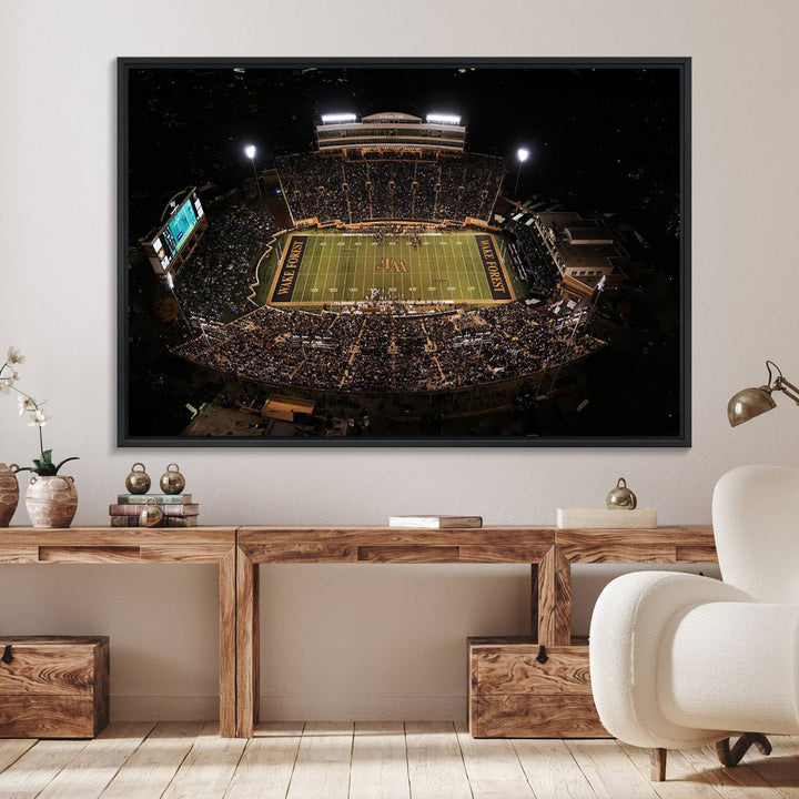 Canvas wall art displays an aerial view of Wake Forest Demon Deacons stadium at night.