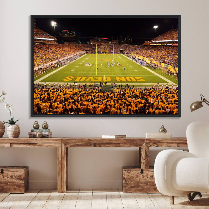 The Phoenix Stadium Canvas Wall Art features a vibrant depiction of a packed stadium filled with ASU Sun Devils fans wearing yellow shirts.