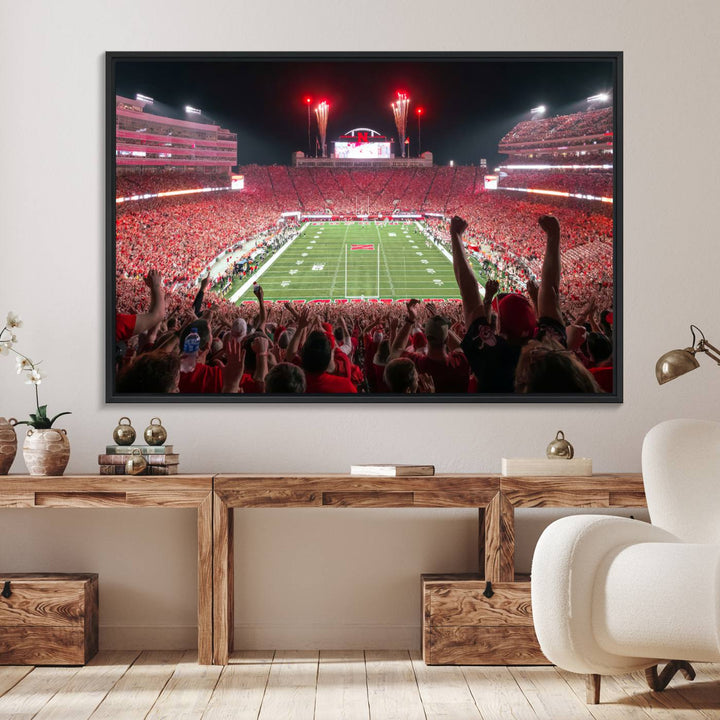 A vibrant canvas print of the Lincoln Memorial Stadium at night with fireworks, featuring the University of Nebraska Cornhuskers Football.