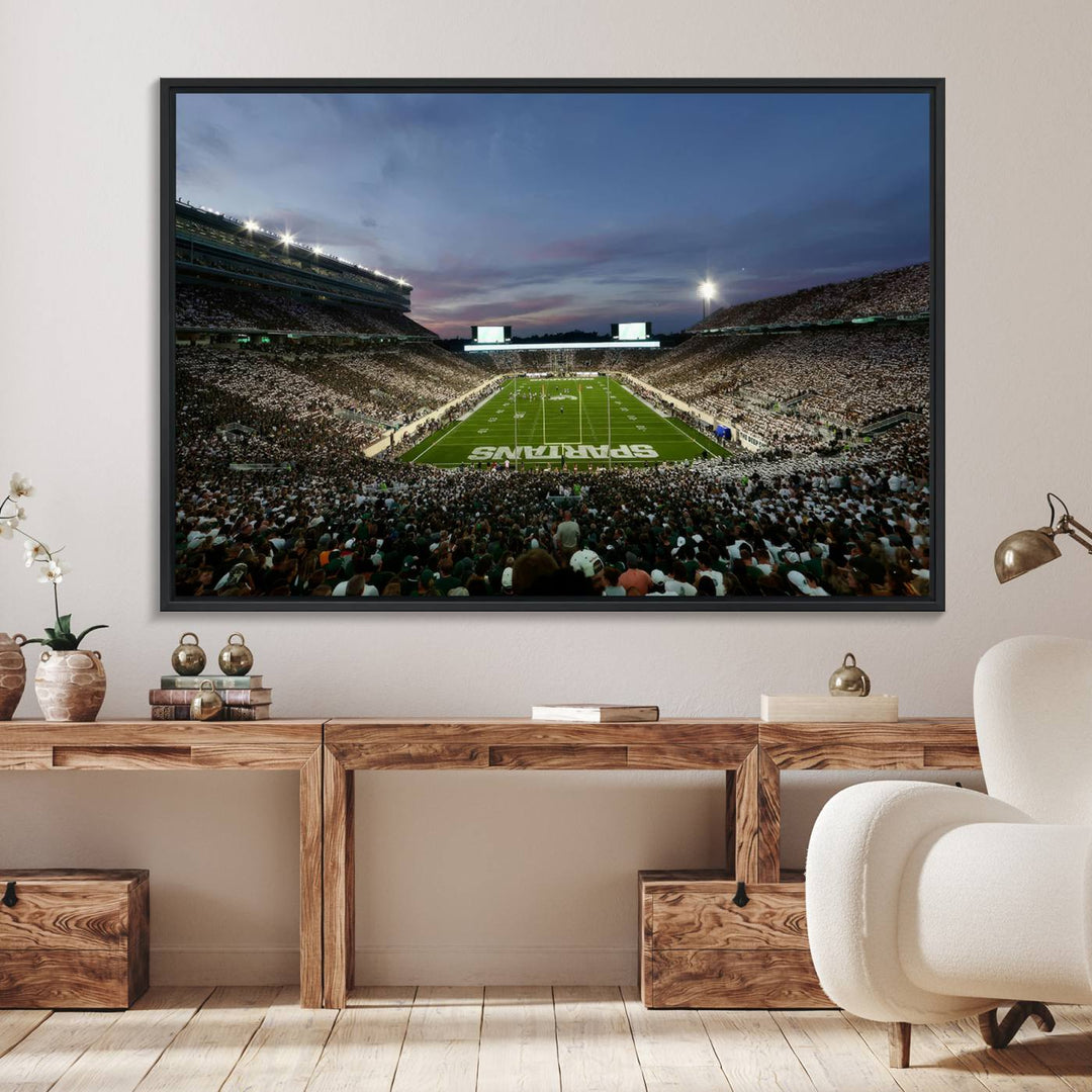 Wall art featuring a stadium at dusk with full stands—ideal for the Michigan State Spartans Football Team Canvas Print.