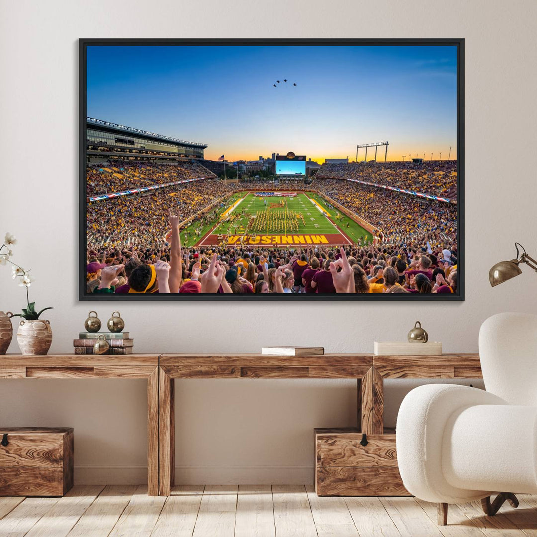 Canvas wall art featuring the University of Minnesota Football Team print, showcasing Huntington Bank Stadium at sunset with jets overhead.