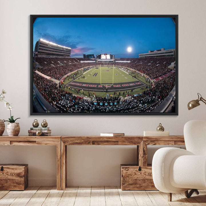 The wall art in the living room features a Texas Tech Red Raiders Football Team Print, showcasing Jones AT&T Stadium at dusk.