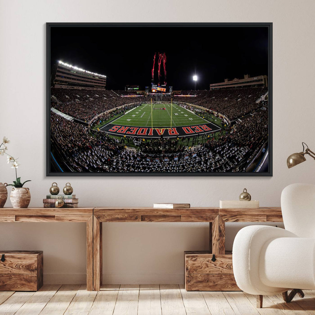 The wall features a Texas Tech Red Raiders Football Team Print on canvas, showcasing fireworks over a packed stadium at night.