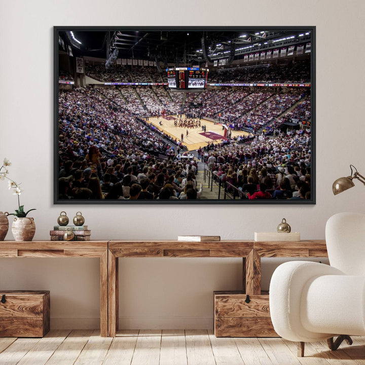 The Nebraska Basketball Arena Wall Art Canvas features an arena filled with Cornhuskers fans and players beneath a scoreboard.