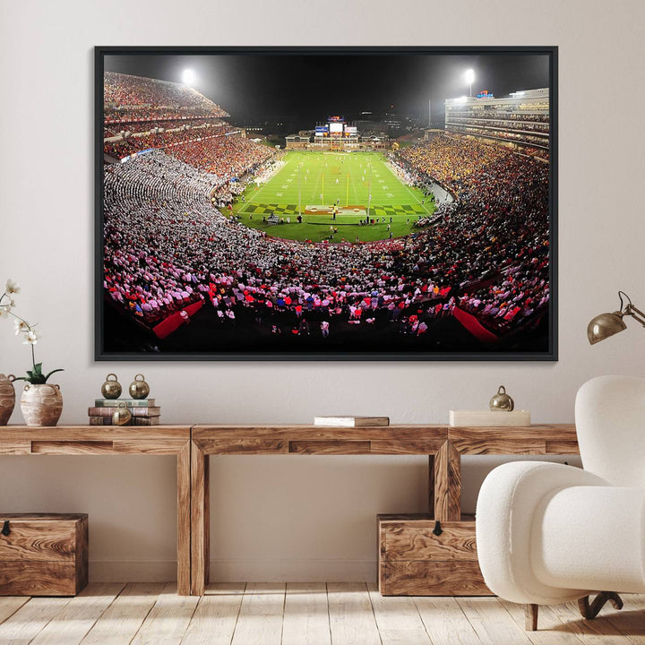 The Maryland Terrapins Football Wall Art Canvas showcases a packed SECU Stadium at night with a bright field and cheering fans.