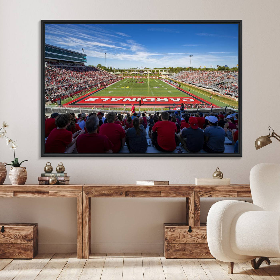 The Ball State Cardinals wall art on canvas depicts fans in red at Scheumann Stadium.