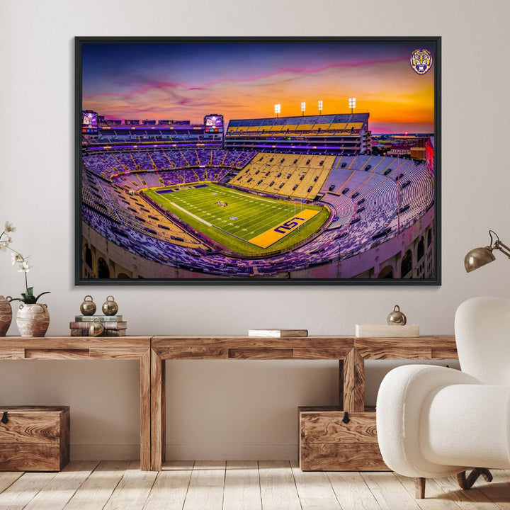 A canvas print of Tiger Stadium at sunset, depicting an empty field and stands, adorns the wall.