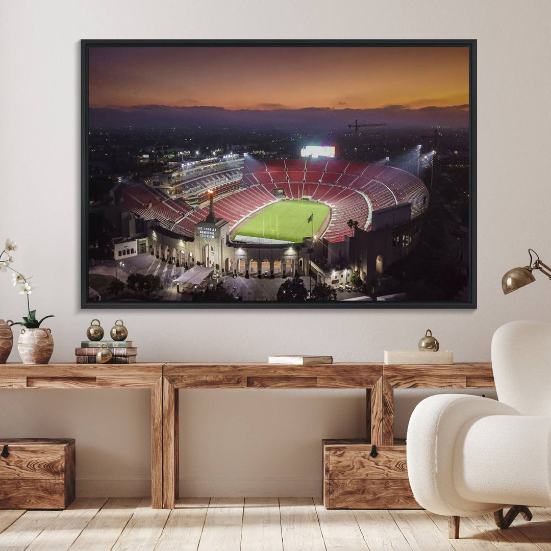 The USC Trojans Stadium canvas captures Memorial Coliseum at twilight, showcasing red seats and a green field beneath an orange sky.