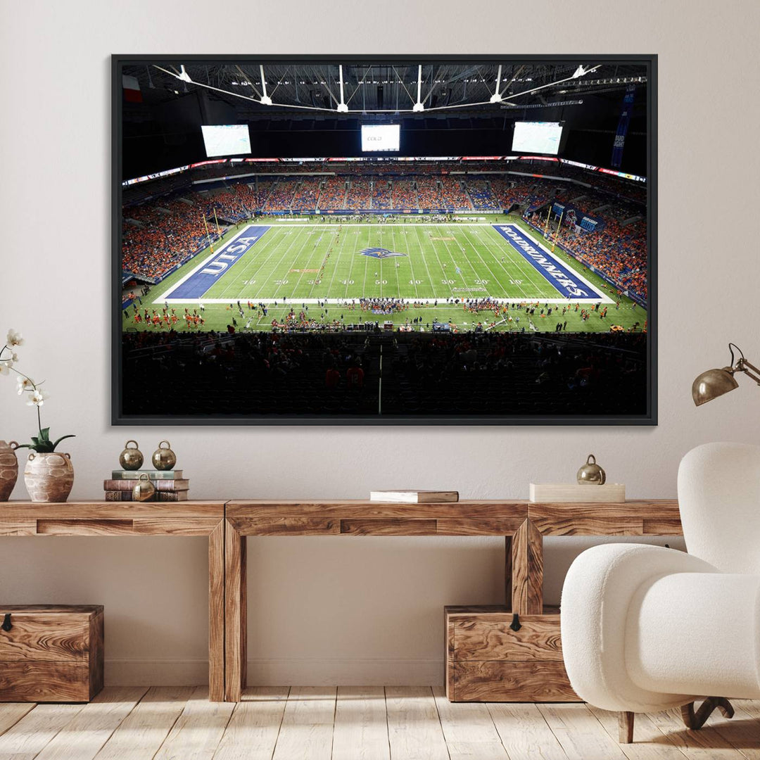 The UTSA Roadrunners game at Alamodome canvas print captures the scene from above, displaying fans and the UTSA lettering on the field.