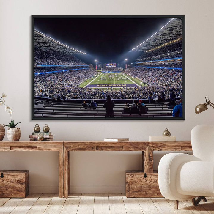 A canvas print titled The University of Washington Huskies Football depicts a packed Husky Stadium at night, as seen from the stands.