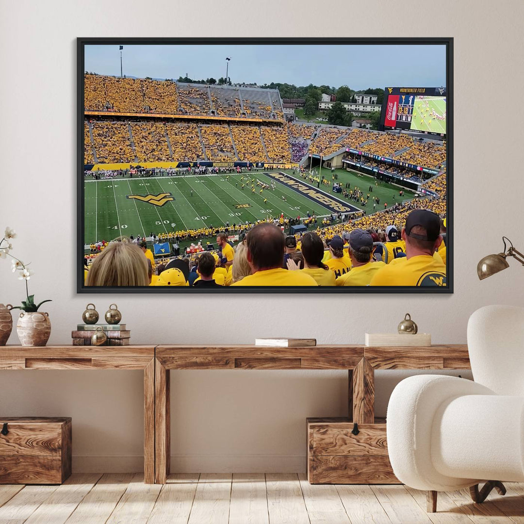 A Puskar Stadium canvas print decorates the modern living room shelf.