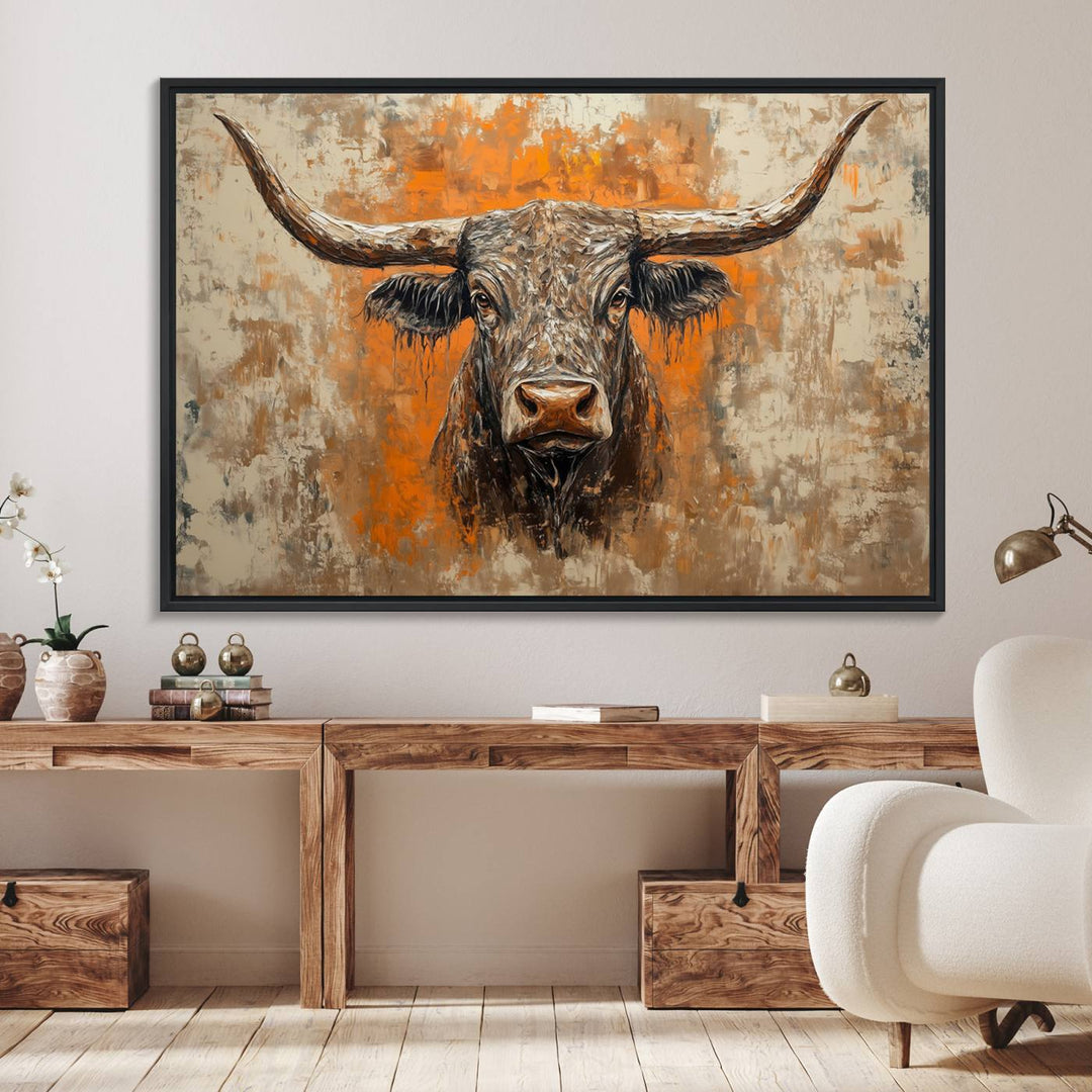 Abstract Cow Longhorn Bull Wall Art presents a detailed face centered on a textured orange and beige background.