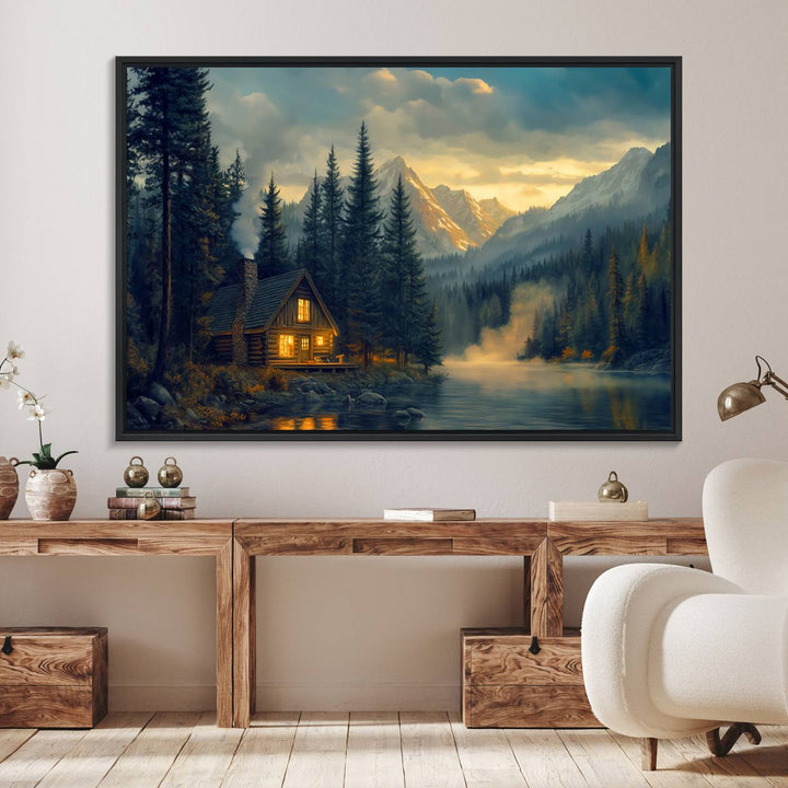 Serene sunset lake wall art: a cozy mountain cabin with lights, framed by pine trees and set against a moody sky. Ideal for adding rustic lodge charm to your space.