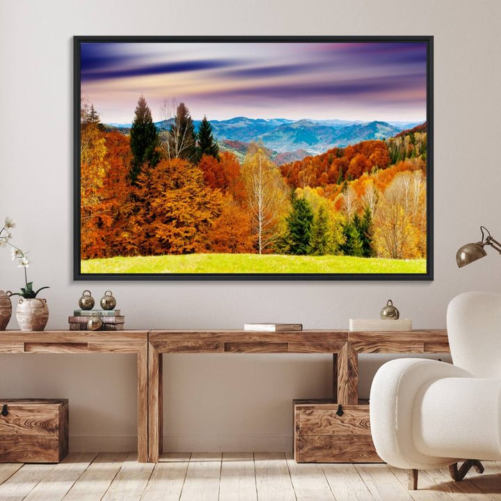 The wall art in the kitchen dining area is a large Autumn Forest Mountain Canvas Print that captures a vivid scenic landscape.