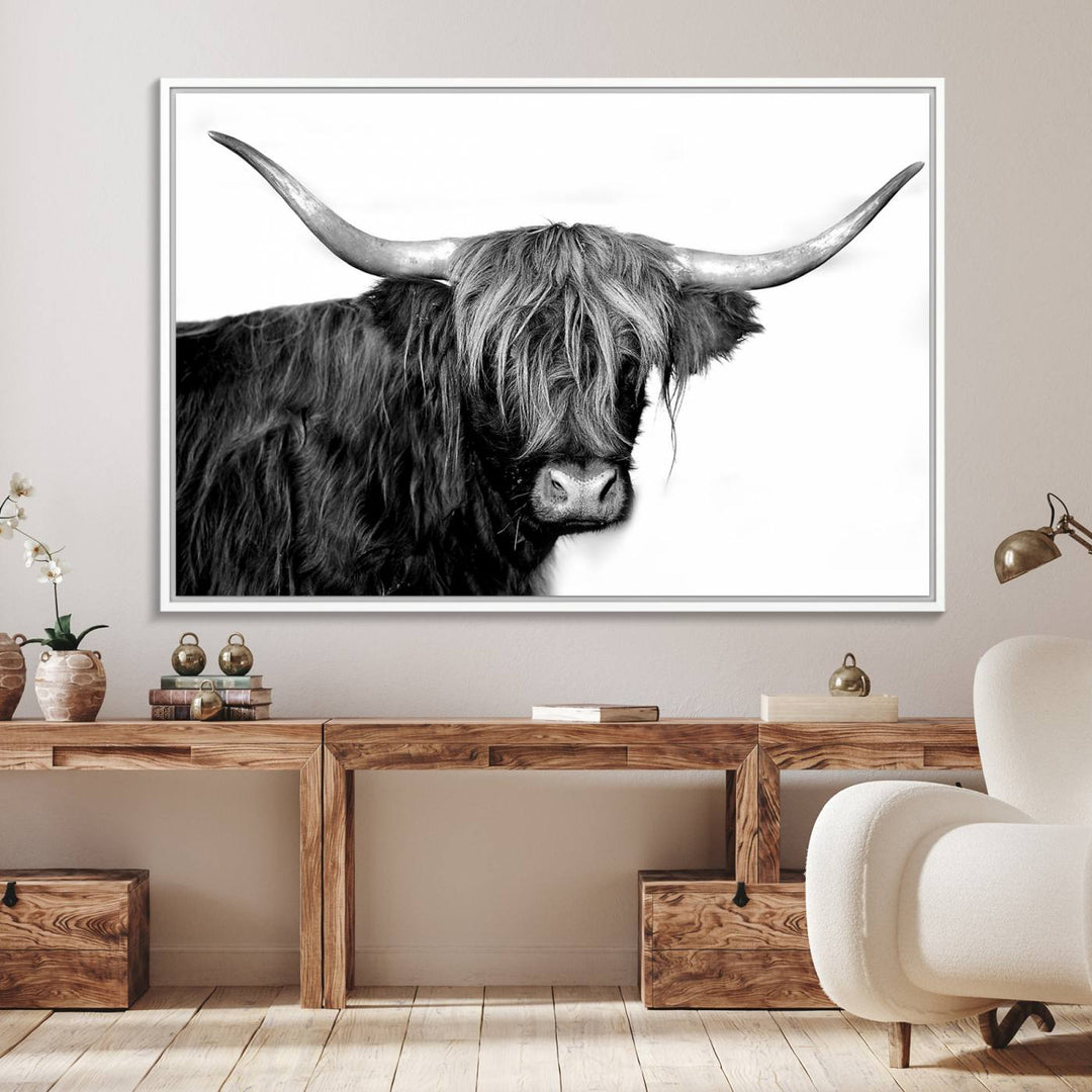 The Black and White Highland Cow Multi Panel Wall Art Canvas Print with UV-protection hangs prominently.