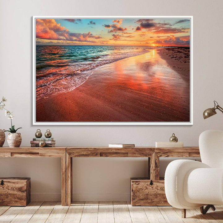 A Vibrant Sunset Beach Canvas Print with ocean waves and sandy shoreline enhances coastal-themed interiors.