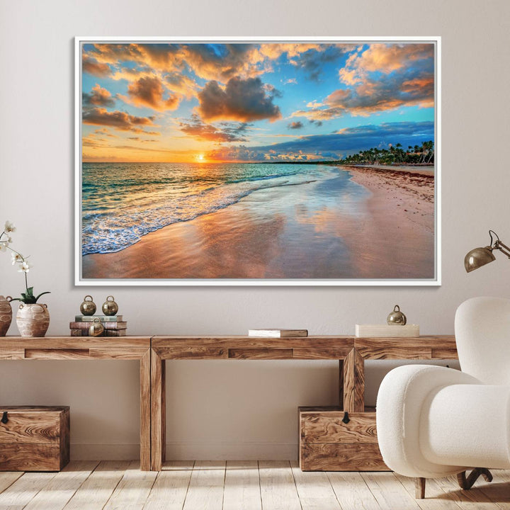 A wall displays Sunset Ocean Waves on Tropical Beach 3-panel canvas art.