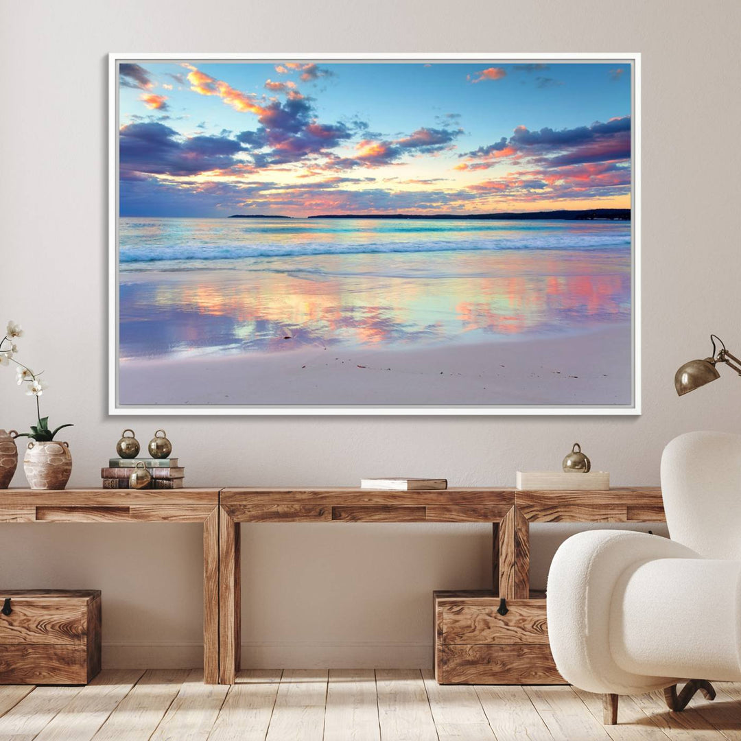 The Tranquil Pastel Sunset Beach Triptych Canvas Art hangs, showcasing its serene beauty.