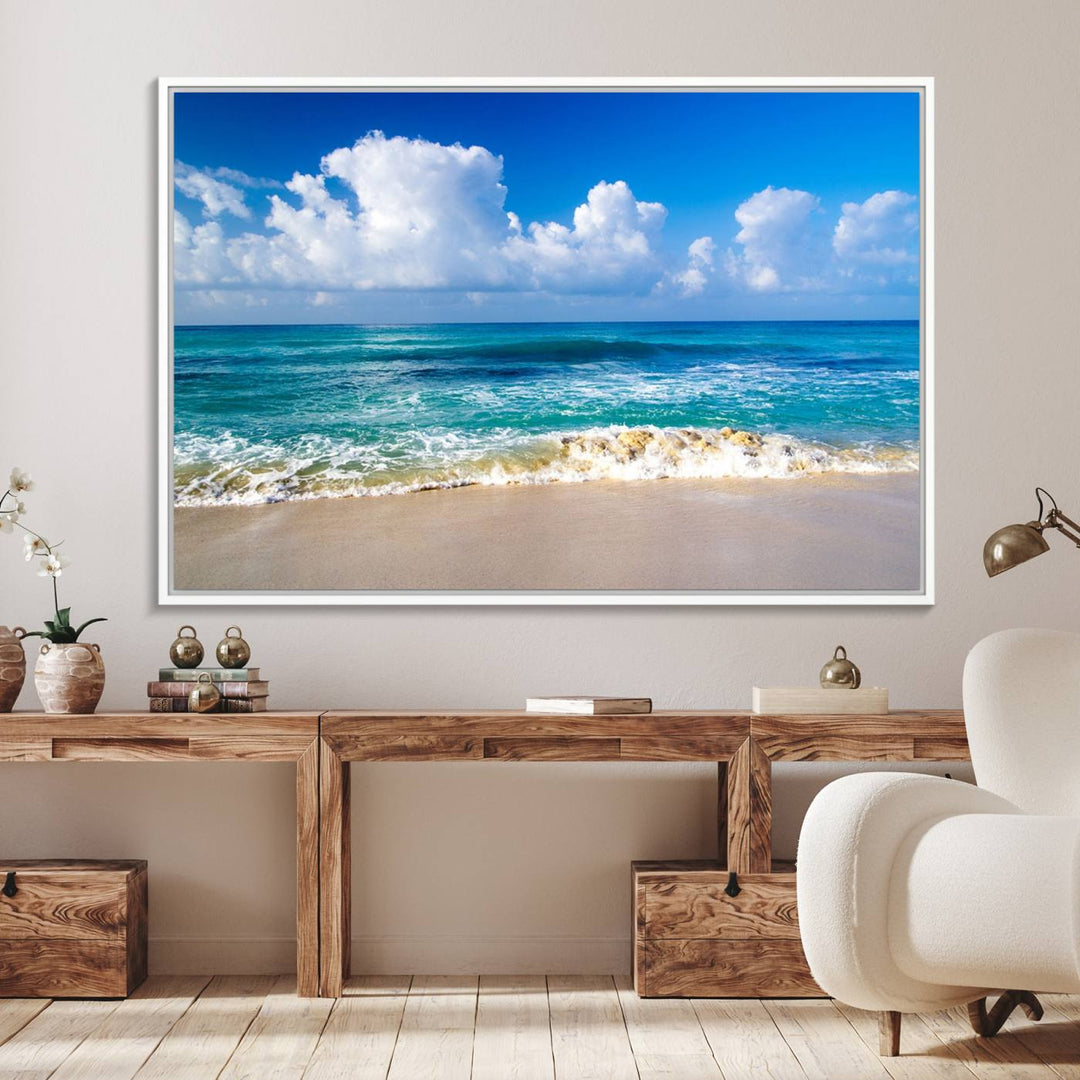 The Tropical Beach 3-Panel Canvas Wall Art features ocean waves gently lapping on a beach under blue skies, making it an ideal choice for coastal decor.