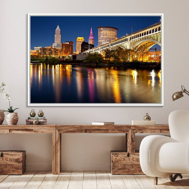 Cleveland Night Skyline Canvas: Cityscape with an illuminated bridge reflecting on calm water.