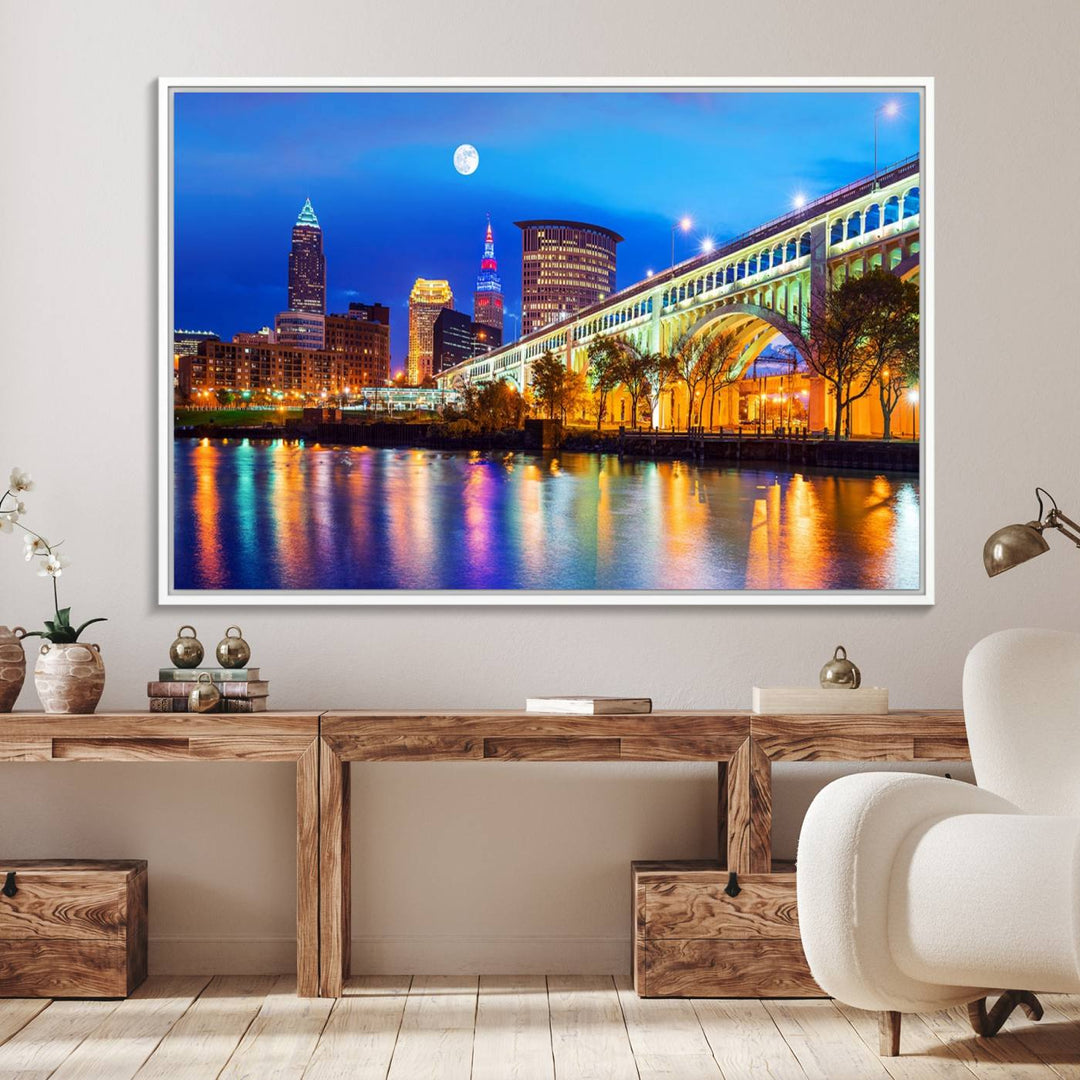 A Cleveland Night Skyline Wall Art on museum-quality canvas showcases a bridge and illuminated buildings.