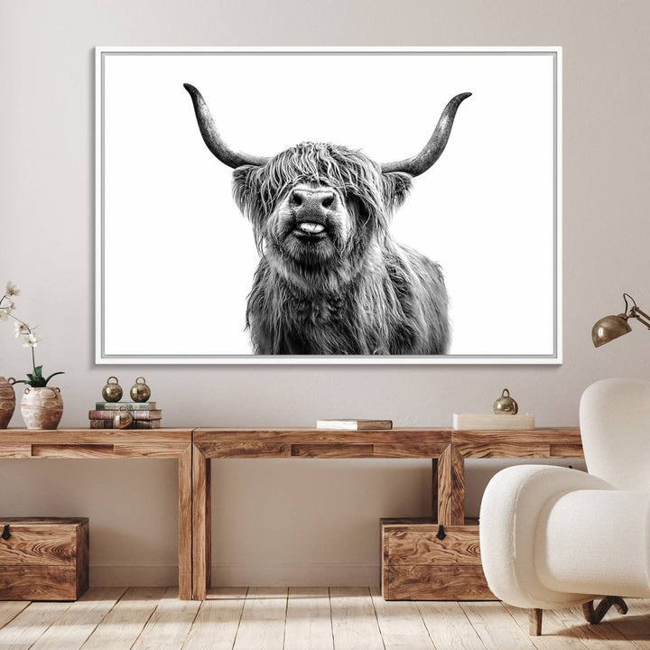 The Fanny Highland Cow art print decorates the modern kitchen, featured in black and white.