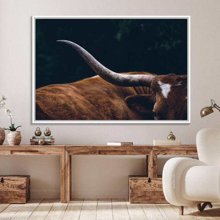 The kitchen dining area features a Texas Longhorn Bull wall art.