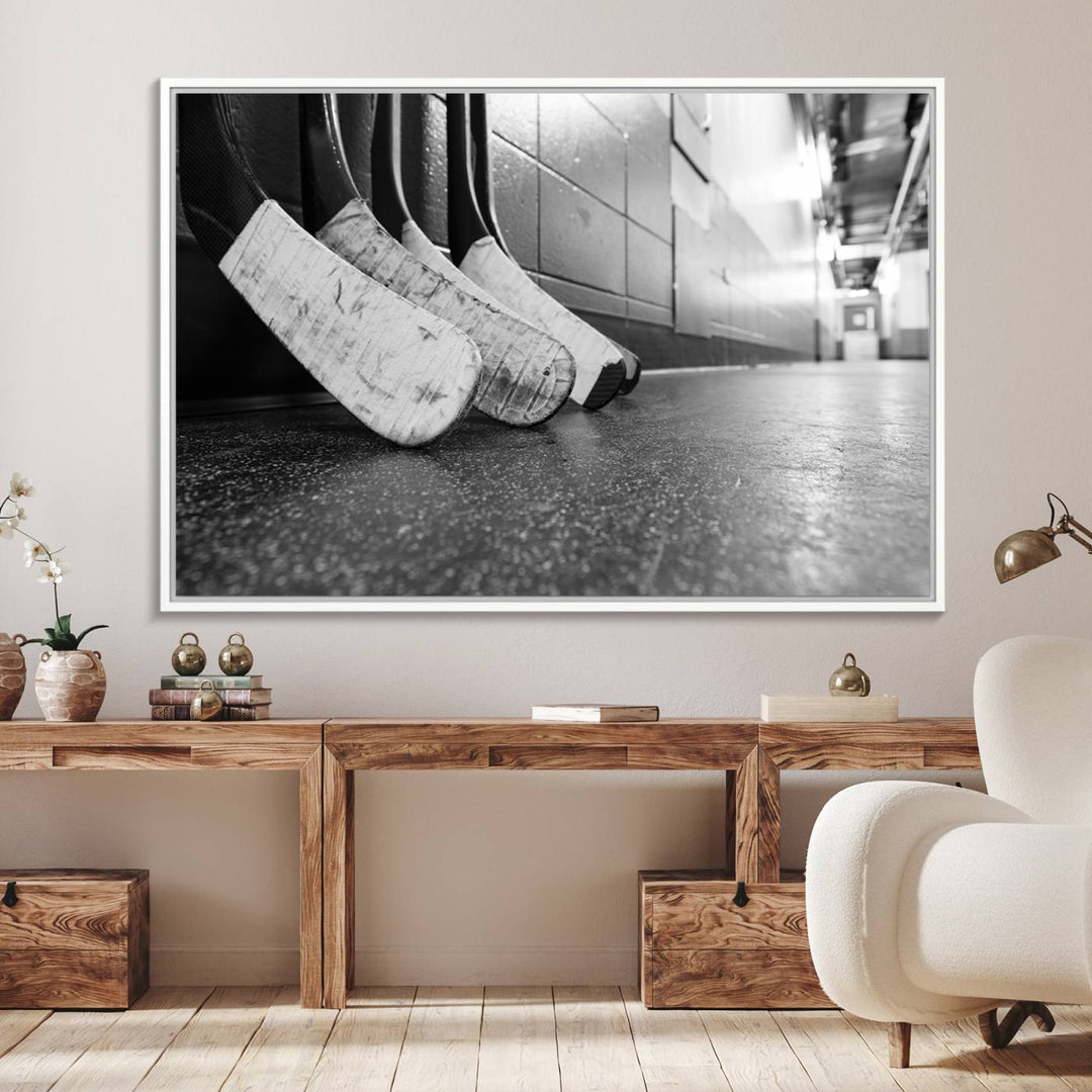 Ice Hockey Wall Art Canvas Print features a UV-protected black and white photo of hockey sticks.