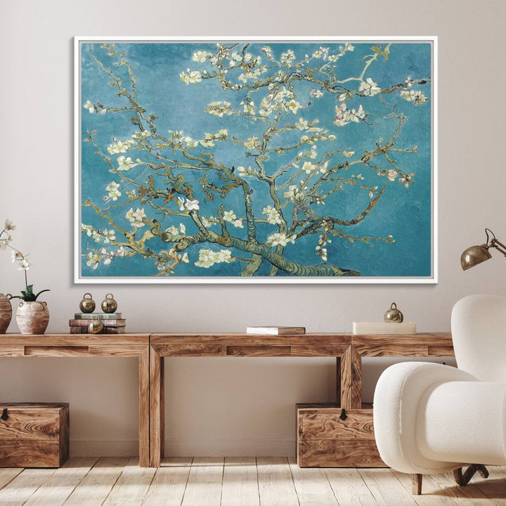 The wall art, Vincent Van Goghs Almond Blossom, stands out with its vibrant depiction against a serene blue background.