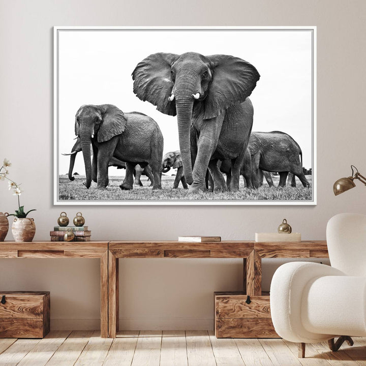 A modern dining area features a Black White Elephant Family Wall Art Canvas Print.