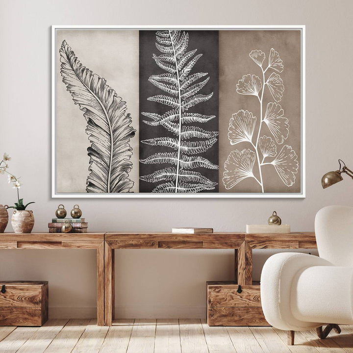 Three framed botanical wall art pieces are displayed in a bright room.