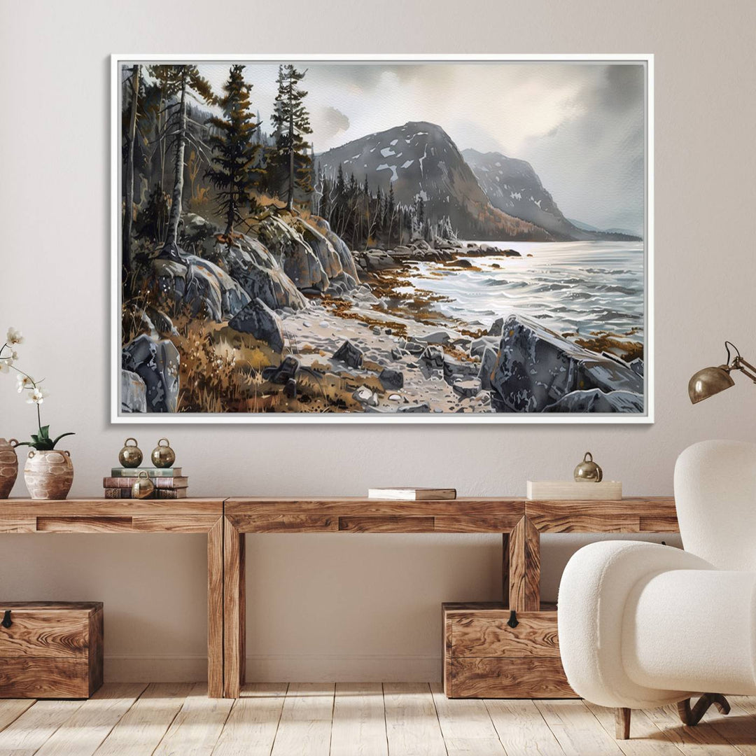 Framed wall art depicting Acadia National Parks rocky coast, trees, mountains, and sunlight over the sea; ready to hang.