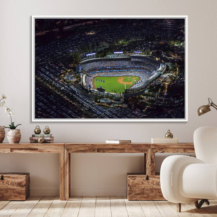 A large Los Angeles Dodgers print of Dodger Stadium at night is displayed near a window.