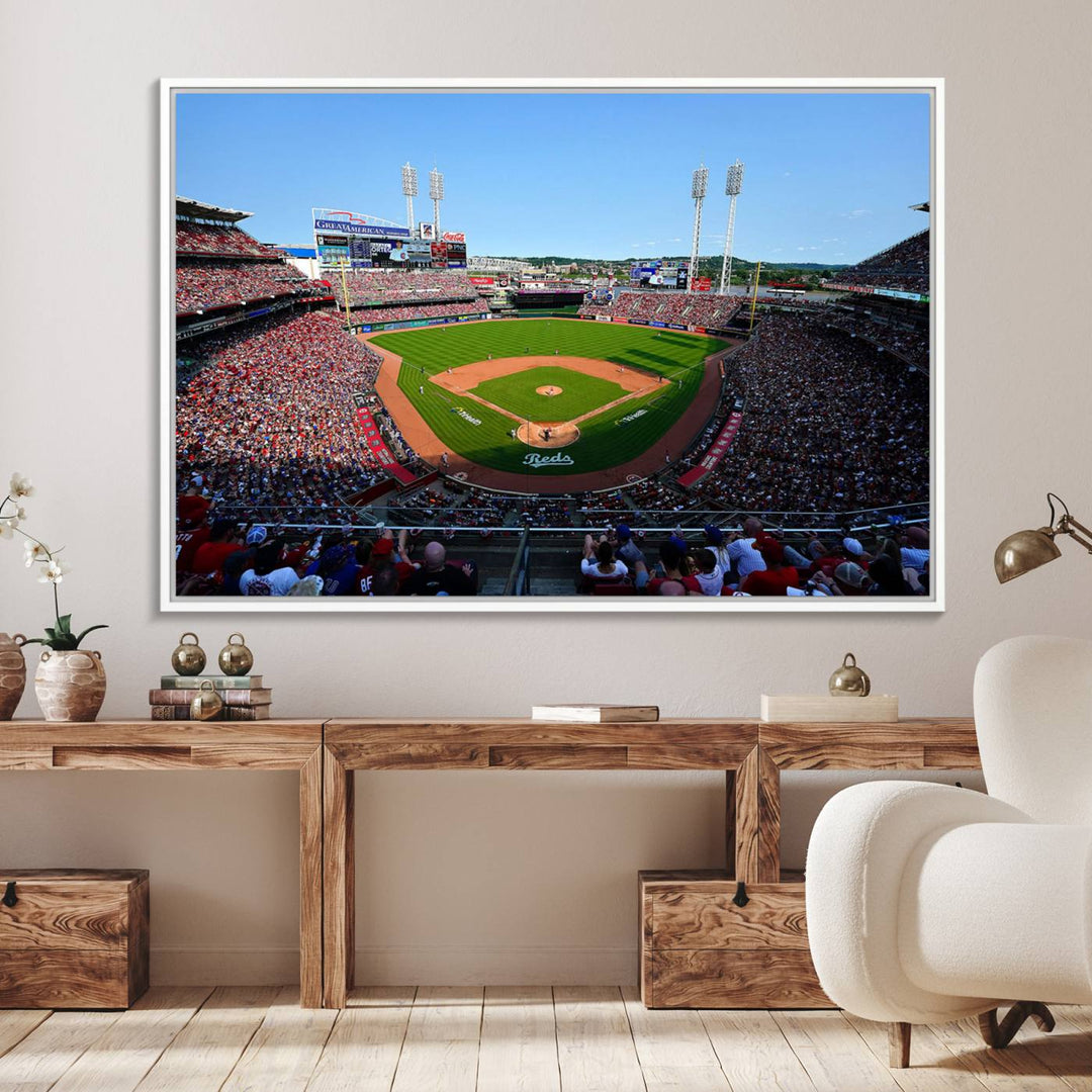 The Cincinnati Reds Baseball Team print of Great American Ball Park Stadium adorns the wall.